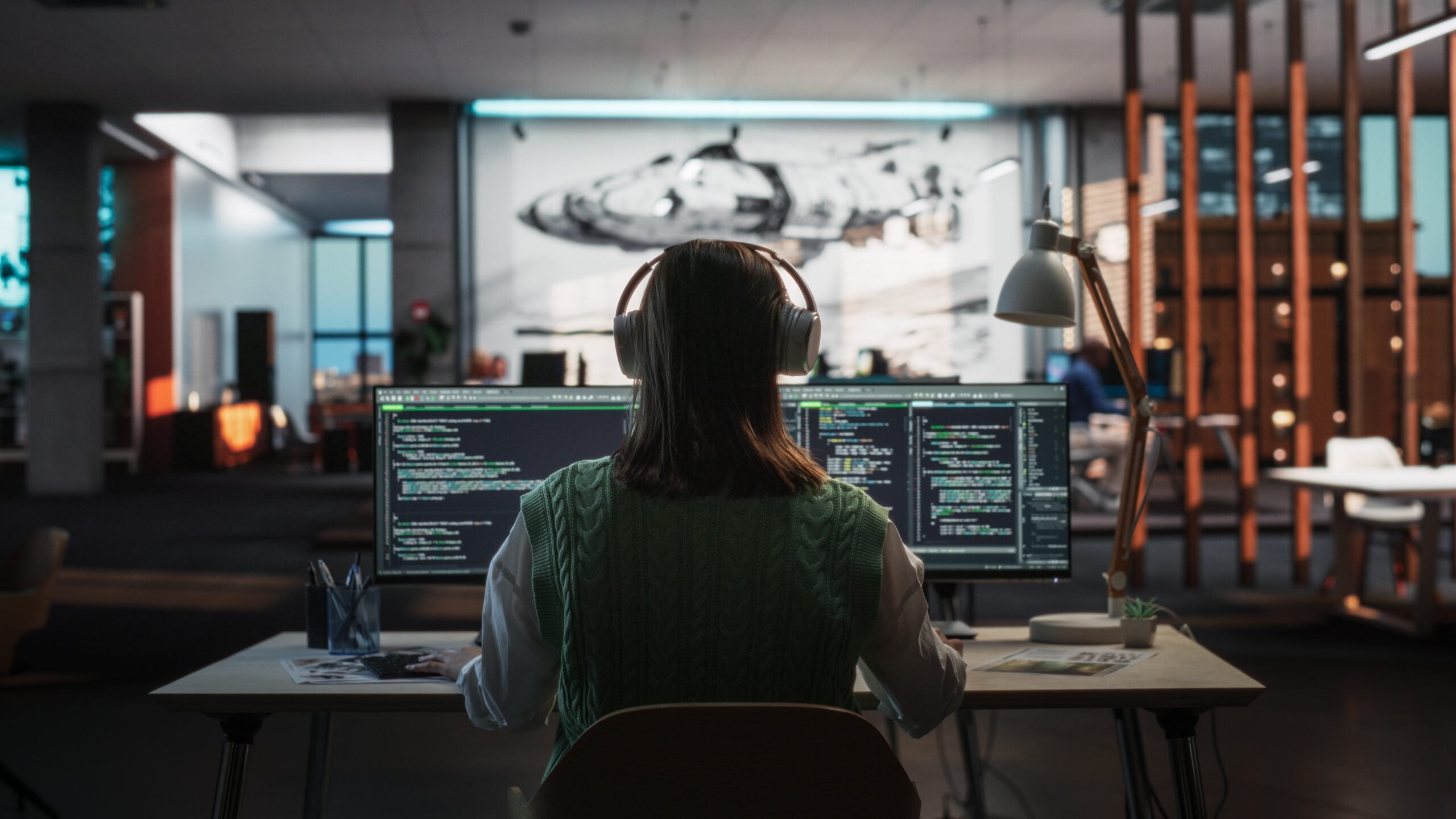 Software developer at work station for AI in application security GitLab
